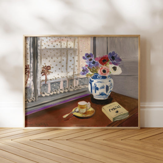 The image is a framed painting depicting a vase of colorful flowers on a table, with a book and a cup of tea nearby.