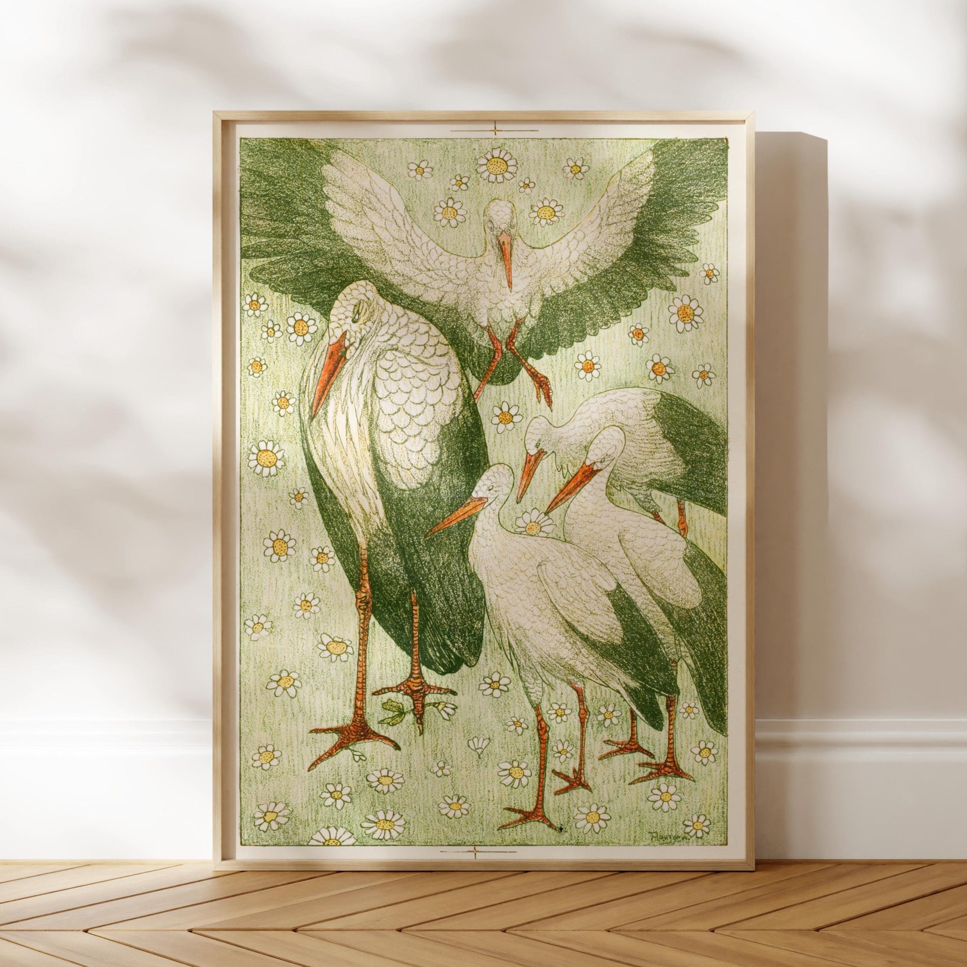 The image is a framed illustration of several storks, with a green background and white feathers. The storks are depicted in various poses, creating a dynamic and lively scene.