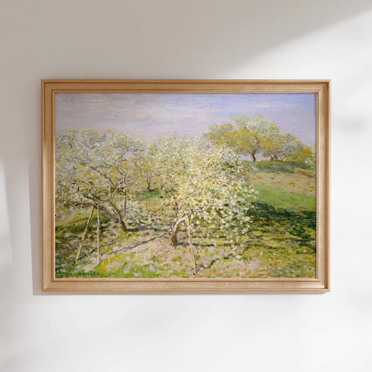 The image is a framed painting depicting a serene landscape with trees in full bloom, set against a backdrop of a blue sky.