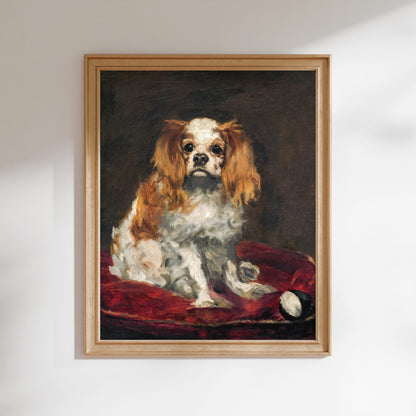 The image is a framed painting of a Cavalier King Charles Spaniel dog sitting on a red cushion.