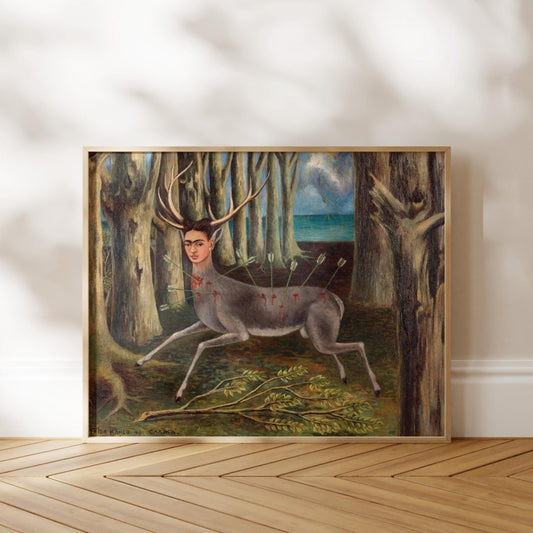 The image is a framed painting depicting a deer with antlers standing in a forest setting.