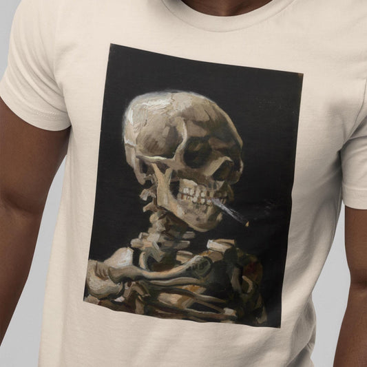 A man wearing a white t-shirt with a framed image of a skeleton smoking a cigarette.